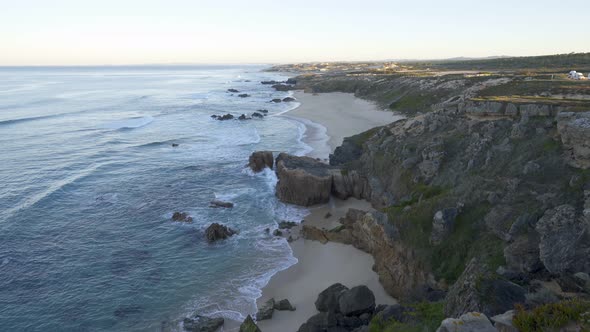 Praia do Malhao beach view at sunrise, in Portugal