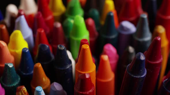 Rotating shot of color wax crayons for drawing and crafts