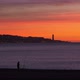 Silhouette of a fisherman in a beautiful sunrise over the Mediterranean sea. Malagueta Beach - VideoHive Item for Sale
