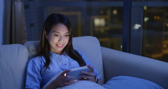 Woman use of smart phone at home