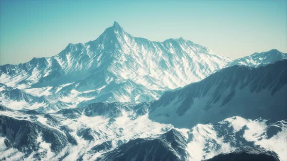 Mountain Winter Caucasus Landscape with White Glaciers and Rocky Peak