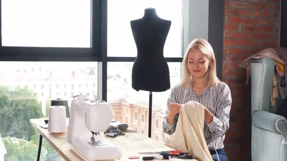 Lovely Blonde Dressmaker Is Good at Embroidery