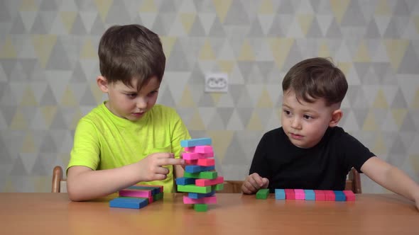 Children Have Fun and Learn While Playing a Board-game at the Preschool Class.