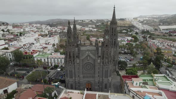 Aerial View Of Church of San Juan Bautista. Pedestal Up, Tilt Down, Dolly Back Reveal