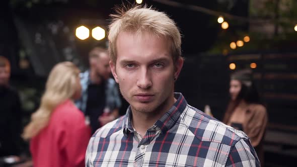 Positive Mood, Male Portrait, Lights Bulbs, Music, Dancing People at the Party