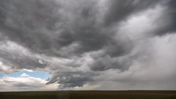 Time lapse of severe storm rotating in the sky trying to form a tornado