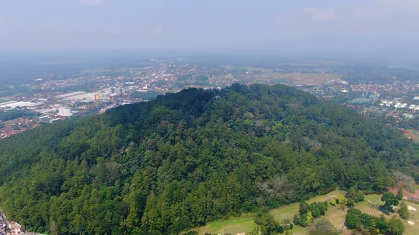 Bukit Tidar and Magelang city in background, Indonesia. Aerial panoramic view