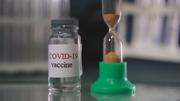 Covid19 Infected Samples and Vaccine in Tube on Table in Corona Virus Covid 19 Research Laboratory