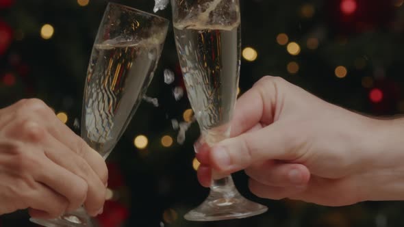 Champagne glasses toast at Christmas