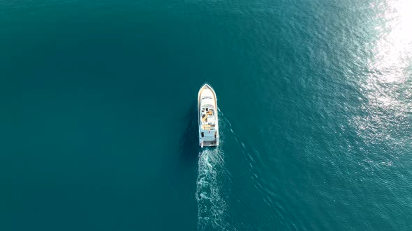 The yacht calls at the port aerial view 4 K