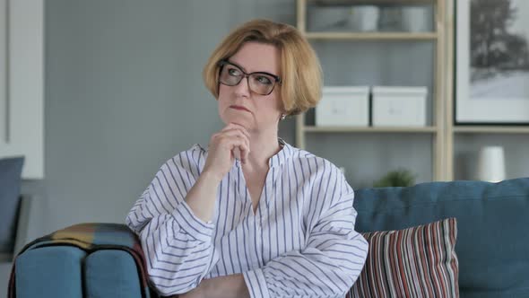 Pensive Thinking Sitting Woman