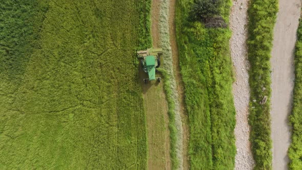 Combine harvester mowing Wheat, Aerial view