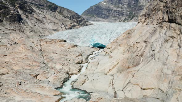 Drone Over Rocks With Meltwater From Glacier