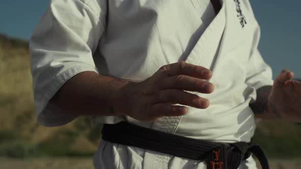 Black Belt Fighter Training Hands Exercises Practicing Karate Ion Beach Closeup