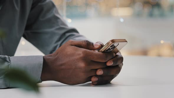 Closeup Male Hands Typing on Mobile Phone Unrecognizable African American Businessman Checking Email