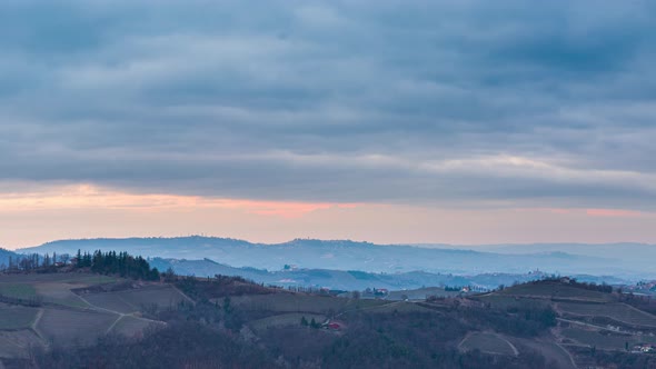 Pan: Italy Piedmont panoramic winter snow view wine yards unique landscape at sunset