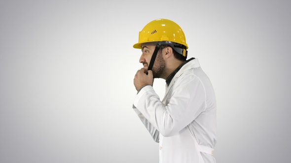 Engineer or Worker Yellow Safety Helmet Hat Putting on