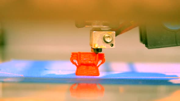 Modern 3D Printer Printing an Object From the Hot Molten