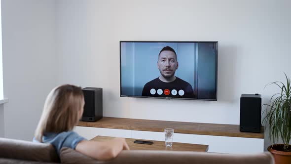 A Woman Is Talking at Home Via Video Link