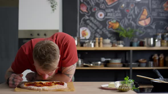 Food Blogger Enjoying Pizza Smell and Showing OK Gesture