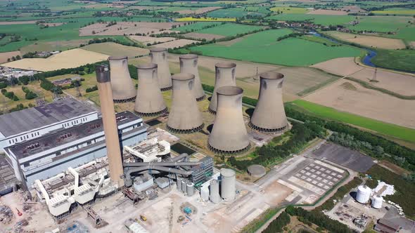 Aerial footage of the Eggborough Power station showing the eight cooling towers and chimneys in UK
