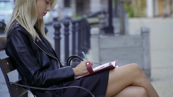 Beautiful Girl in the City Street