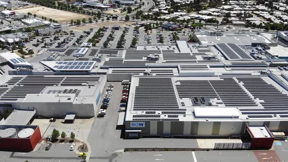 Aerial View of a Building with Solar Panels