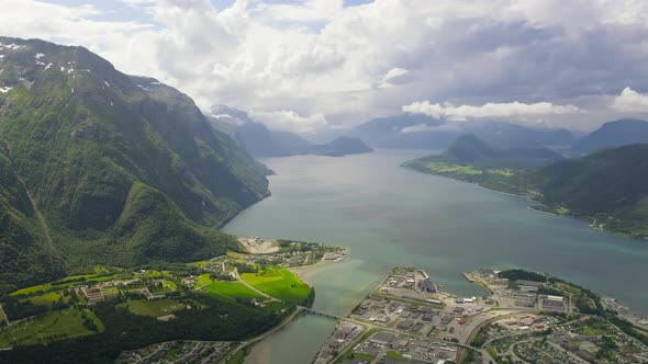 Riverside Townscape Of Aandalsnes At The Valley Of Romsdalen In More Og Romsdal County, Norway. stat