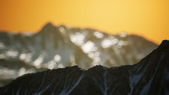 Winter Landscape in Mountains at Sunset