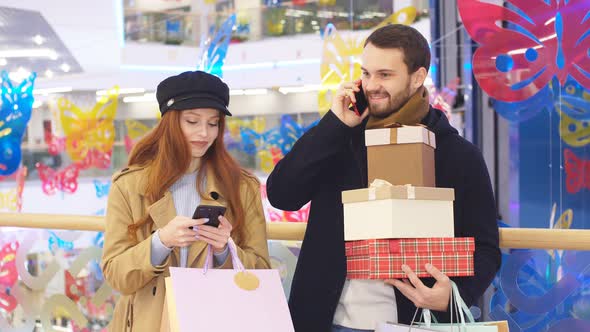 Beautiful Couple on Shopping Trip in Shop Center