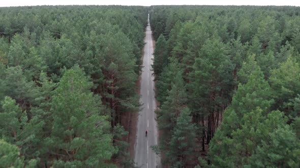 Cycling Alone on empty car forest road