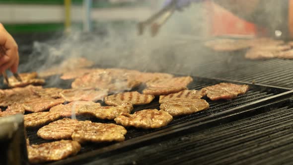 Cooking Cow Meatball Food on a Barbecue Wood Fire