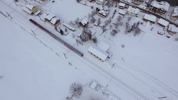 Aerial view of a train rolling during winter