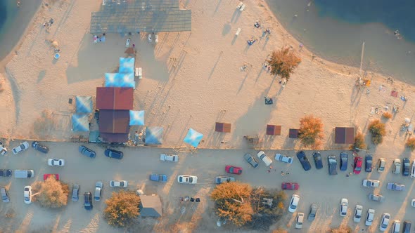 Plenty of Holidaymakers People on the Beach in Blue Azure Lagoon Top Aerial View