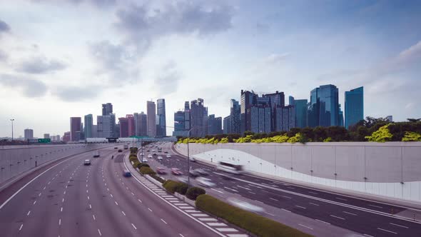 Traffic view with background Singapore landmark financial business district with skyscraper,