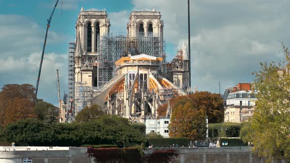 Reconstruction of the Notre Dame De Paris Cathedral Burnt Down in a Fire. In the Frame Cranes for