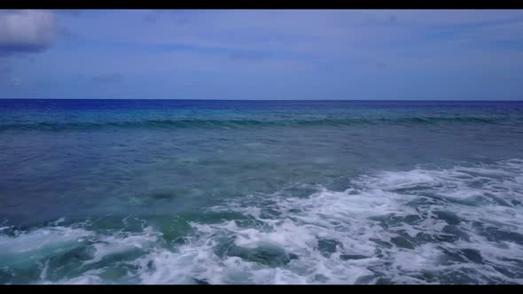 Aerial drone seascape of tropical sea view beach journey by blue ocean and white sandy background of