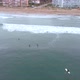 Surfers, Pacific Ocean coast (La Serena, Chile) aerial view, drone footage - VideoHive Item for Sale
