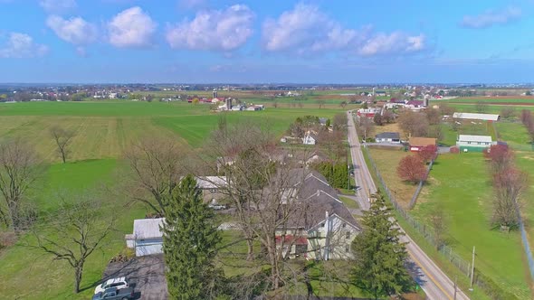 Aerial View of Rural America of Amish Farmlands With Amish Crops on a Sunny Spring Day