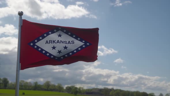 Flag of Arkansas State Region of the United States Waving at Wind