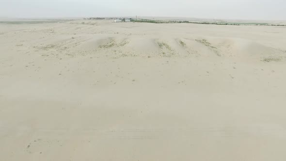 Flight Over the Dunes  Desert  And  Farming