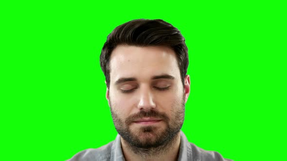 Man relaxing with eyes closed