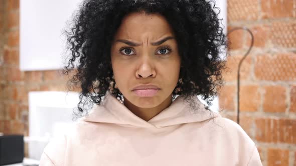 Close Up of Crying Sad AfroAmerican Woman Feeling Upset Tears