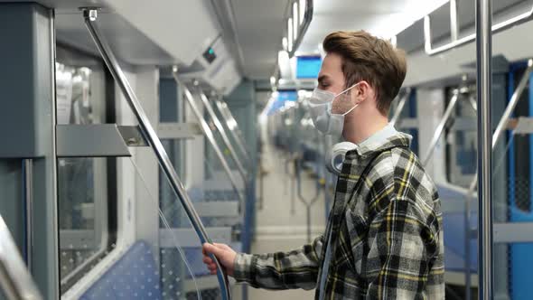 Handheld Young Man in Medical Mask Rides the Subway Student Goes to Study at the University Morning