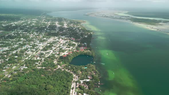 Drone view of the amazing Bacalar lagoon and the deepest cenote in the region, in Mexico