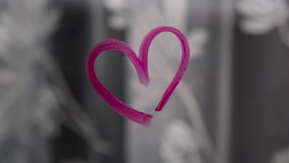 Heart Painted on Glass with Lipstick