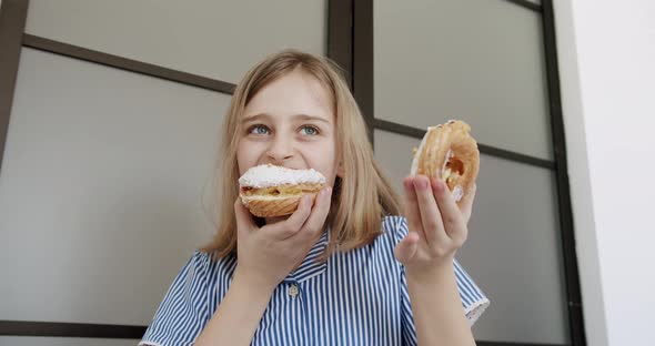 A Teenage Girl Eats a Delicious Donuts at Home for Her Birthday
