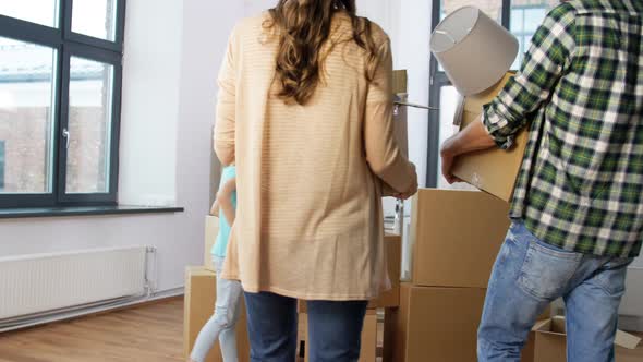 Happy Family with Child Moving To New Home