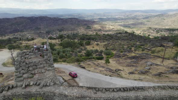 Visitors on the defensive wall of Sortelha, Portugal