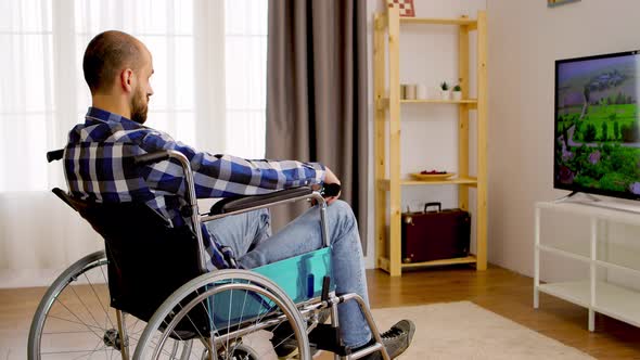 Thoughtful Man Watching TV